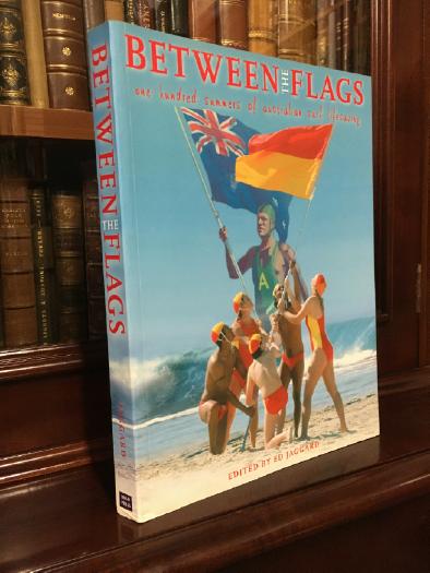 JAGGARD, ED; Editor. - Between The Flags: One Hundred Summers of Australian Surf Lifesaving.