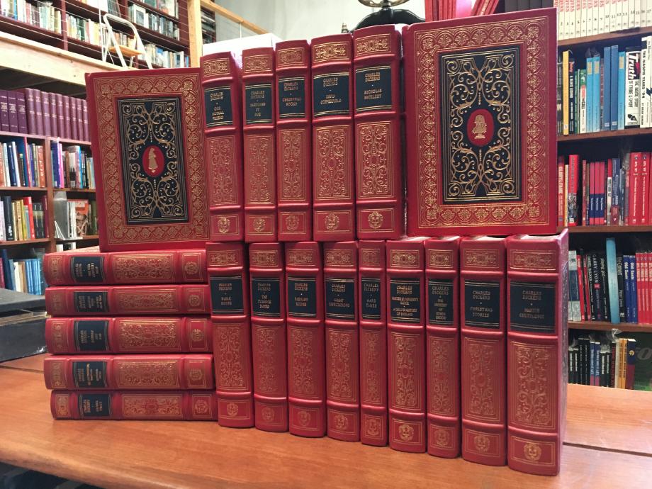 DICKENS, CHARLES. - The Oxford Library of Charles Dickens. (Complete in 21 Volumes). The titles are: American Notes, and Pictures from Italy; Bleak House; Barnaby Rudge; David Copperfield; Christmas Books; Christmas Stories; Dombey and Son; Great Expectations; Hard Times; Little Dorrit; Martin Chuzzlewit; Master Humphrey's Clock, and A Child's History of England; The Mystery of Edwin Drood; Nicholas Nickleby; The Old Curiosity Shop; Oliver Twist; Our Mutual Friend; The Pickwick Papers; Sketches by Boz; A Tale of Two Cities; The Uncommercial Traveller, and Reprinted Pieces.
